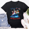 Black t-shirt with Disney design, denim shorts, and white sneakers on a white background
