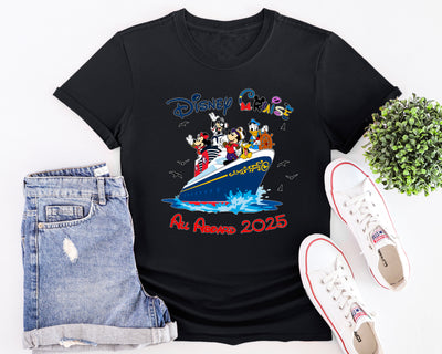 Black t-shirt with Disney design, denim shorts, and white sneakers on a white background