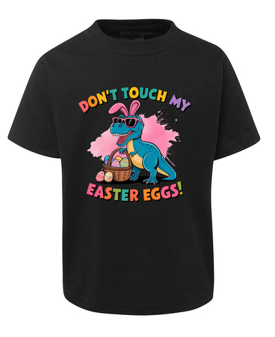 Black t-shirt with a colorful dinosaur graphic and Easter text on a white background