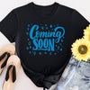 Expecting mum in “Coming Soon” t-shirt, perfect for sharing baby news with family and friends.