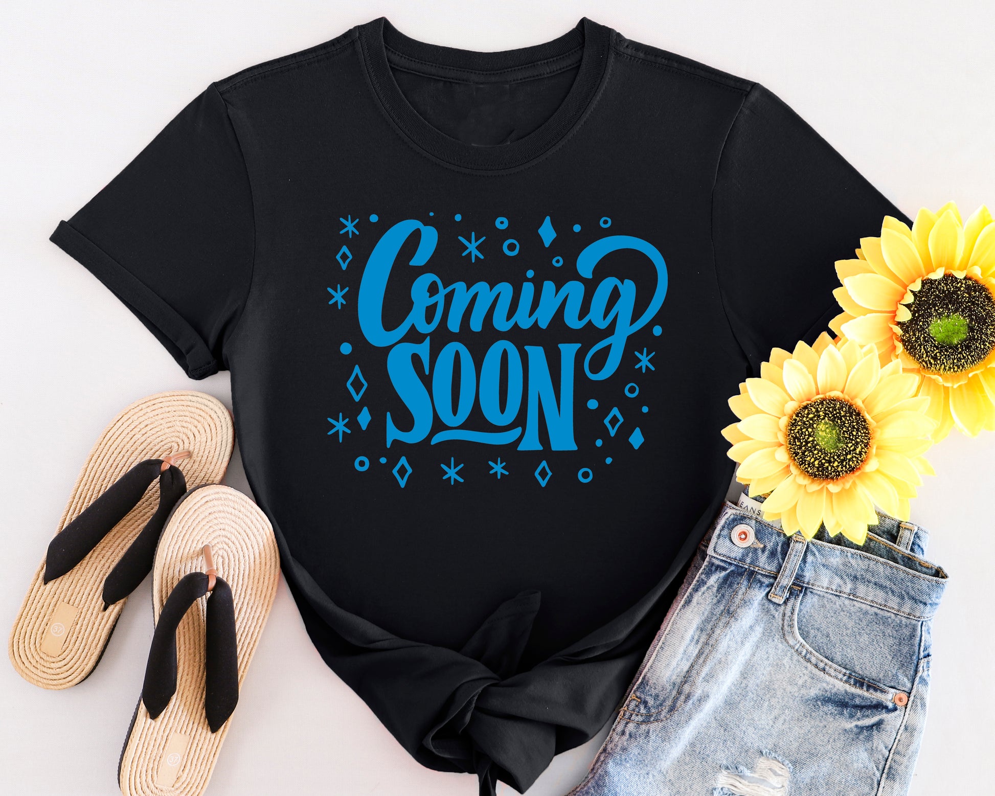 Expecting mum in “Coming Soon” t-shirt, perfect for sharing baby news with family and friends.