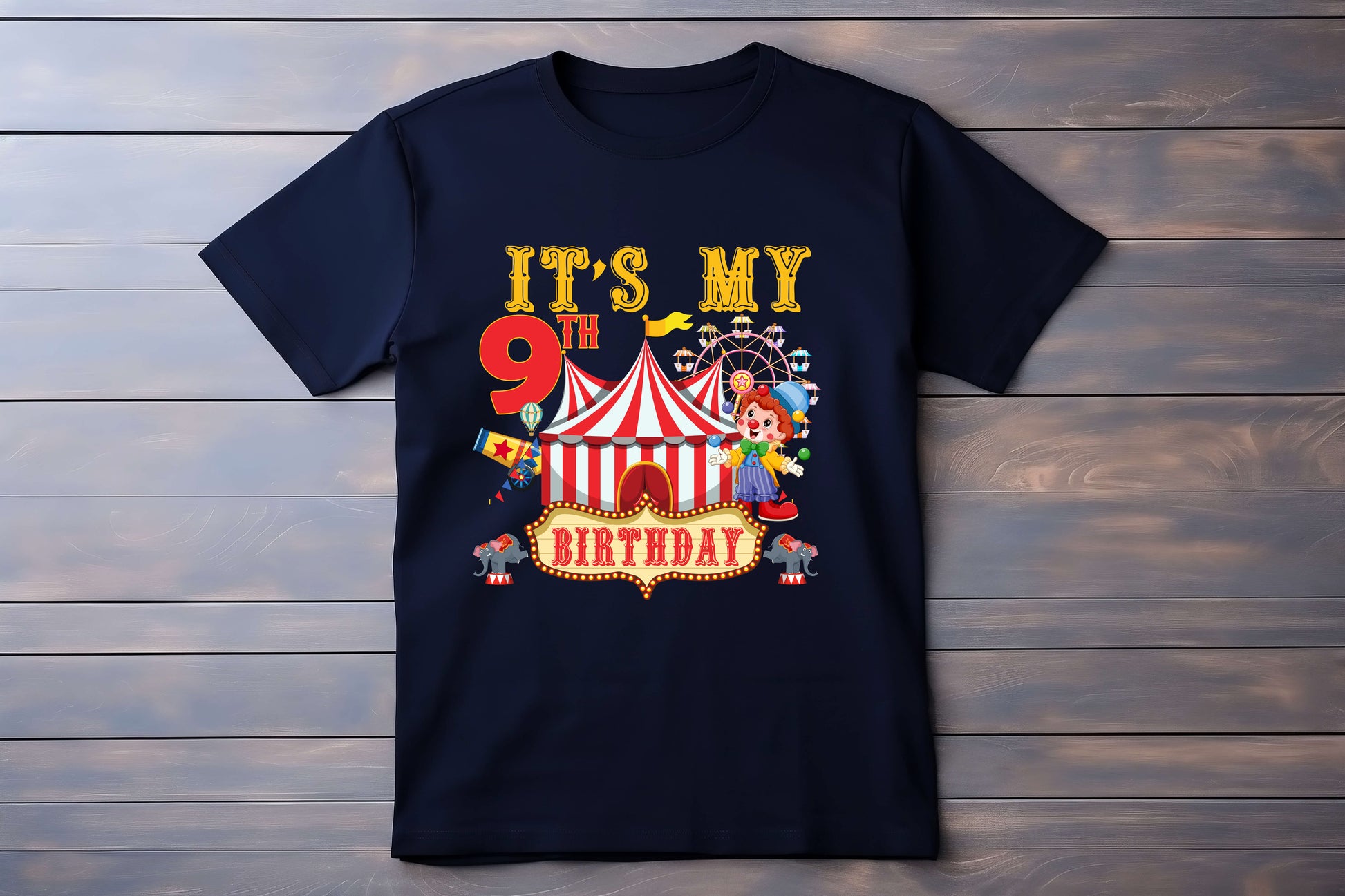 Black t-shirt with a colorful birthday design on a wooden background