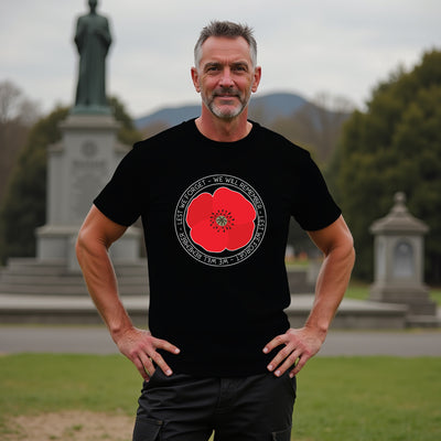 Man wearing a black t-shirt with a red poppy design in a anzac day setting