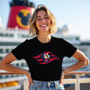 Woman wearing a black t-shirt with a colorful graphic design, standing on a cruise ship deck.