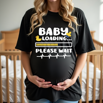 Pregnant woman in “Baby Loading” announcement tee, great for baby showers, maternity photos, or casual wear