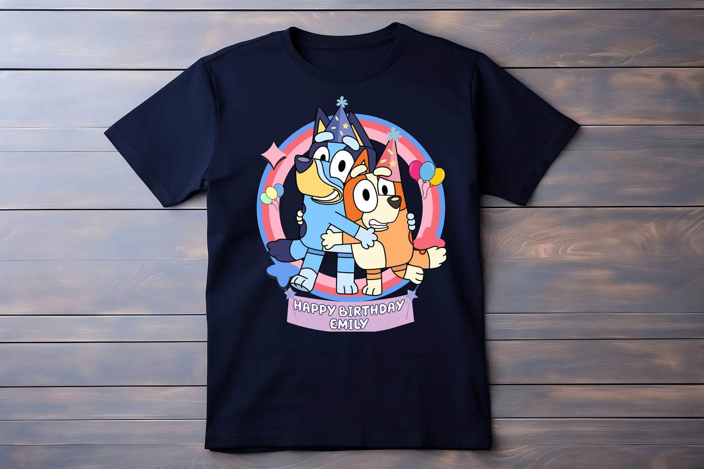 Flat lay of Bluey and Bingo inspired birthday party t-shirt