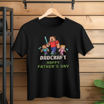 Flat lay of Dadcraft t-shirt featuring Minecraft-style pixelated font and design, perfect for Father’s Day.