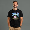 Man wearing a black t-shirt with 'Daddy Pig Party Faire' design on a gray background