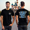 In My Disney Dad Era t-shirt styled flat lay with Mickey ears and park accessories