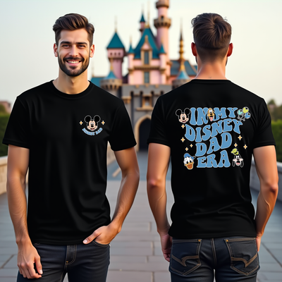 In My Disney Dad Era t-shirt styled flat lay with Mickey ears and park accessories