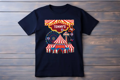 Black t-shirt with a colorful circus design on a wooden background