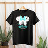 Black t-shirt with Disney 2020 design on a hanger against a light background