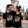 Adult wearing Castle Crew Disney-inspired t-shirt in black, featuring castle graphic and playful text
