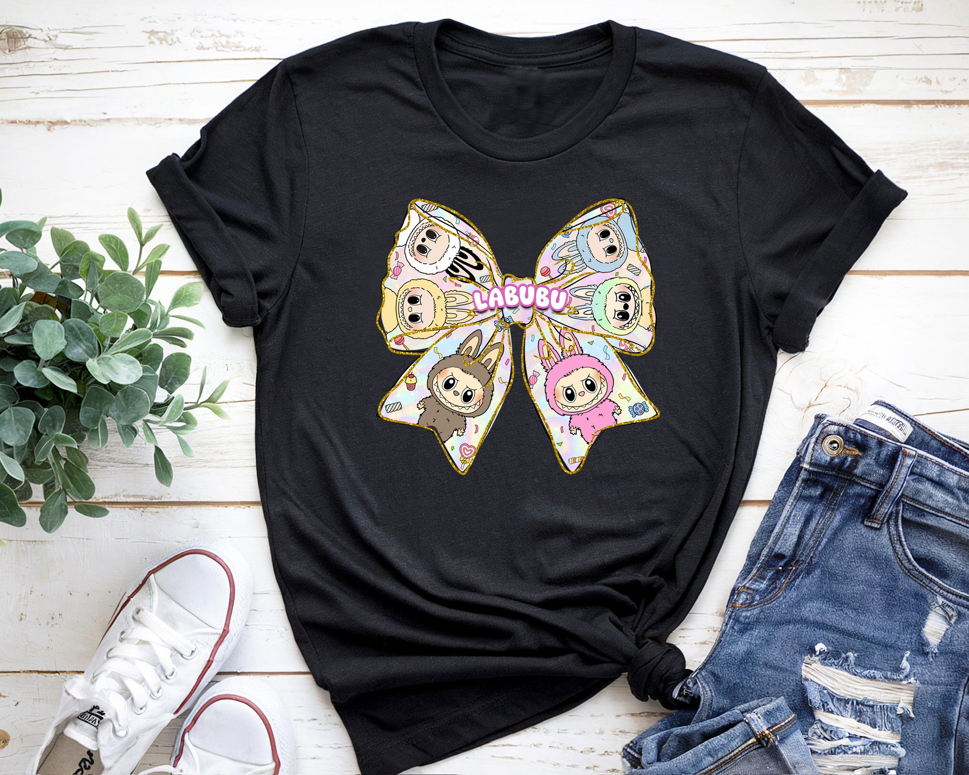 Black Labubu bow tee with colorful kawaii characters