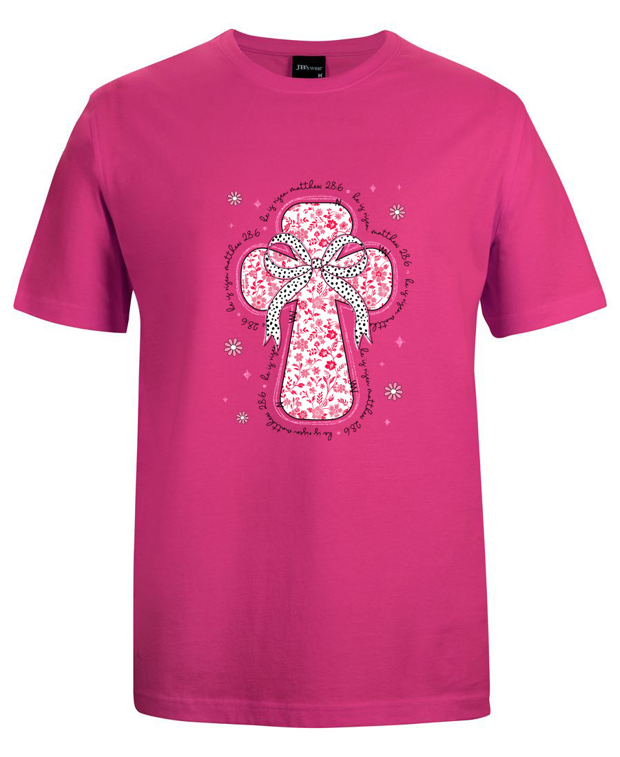 Pink t-shirt with a decorative cross design on a white background