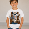 A smiling young boy wearing a white crewneck t-shirt with a colorful graphic of a cowboy costume vest and the text 'THIS IS MY BOOK WEEK COSTUME!', paired with blue jeans, set against a plain light gray studio background.