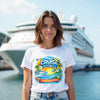 Woman wearing a 'Cruise Director' t-shirt with a cruise ship in the background.