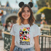Flat lay of The Fab 6 World Tour Eras t-shirt featuring Disney-inspired characters