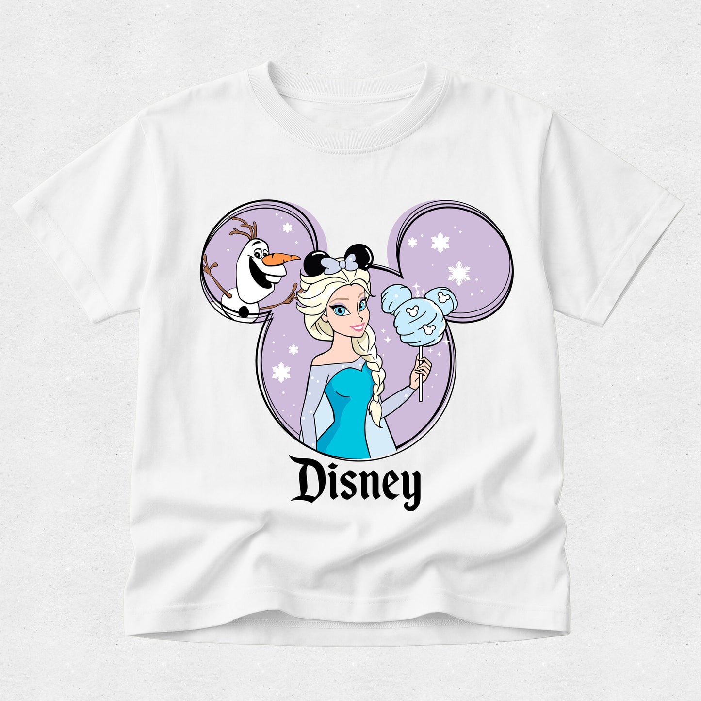 White t-shirt with Disney character design featuring Elsa and Olaf on a light purple circle.