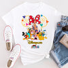 Golden Magical Dreams t-shirt with gold-accented Disney-style design, laid flat on a soft background.