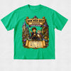 A bright green short-sleeve t-shirt with a detailed graphic print on the front. The graphic features a fantasy illustration of a boy wizard and an owl under a banner reading 'Book Week Quest Jennifer Wizard Academy', with a checklist below.
