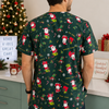 Man wearing a green Christmas-themed scrub top with Santa Claus pattern in a festive setting.