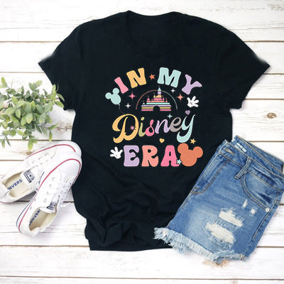 Close-up of Rainbow Castle Era Disney Inspired T-Shirt detailing colorful castle artwork and stitching