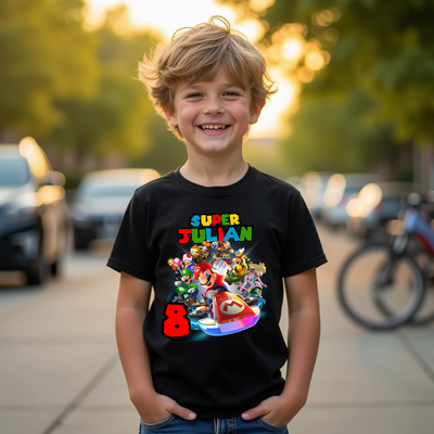 Boy wearing Mario Kart Racer Crew T-shirt outdoors, smiling and showing design