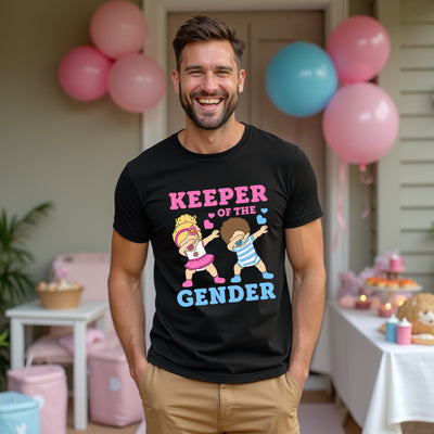 Man wearing a black t-shirt with 'Keeper of the Gender' text and graphics, standing in a room with balloons and party decorations.