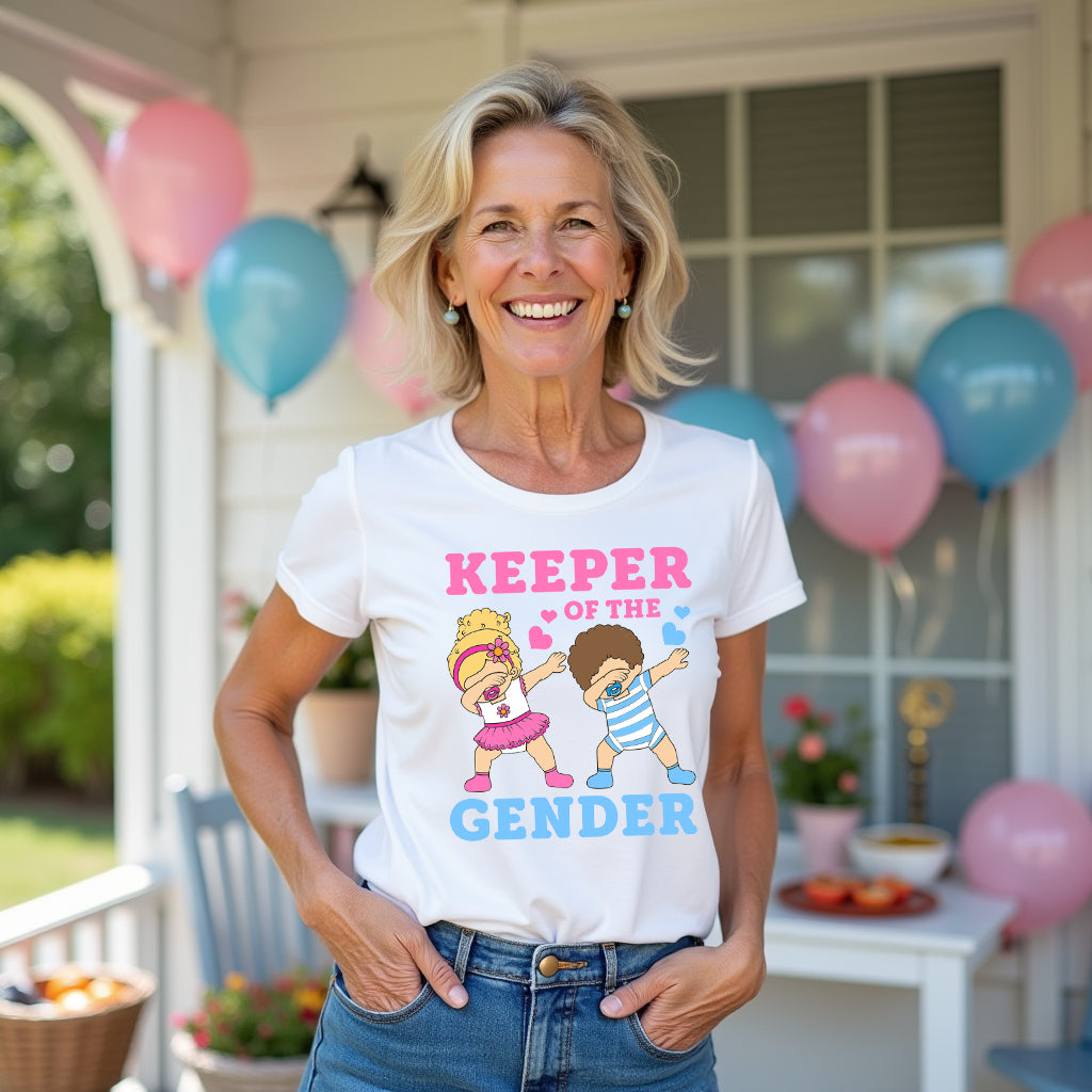 Woman wearing a white t-shirt with 'Keeper of the Gender' graphic in a celebratory outdoor setting with balloons.