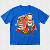 A royal blue short-sleeve t-shirt with a colorful graphic on the front featuring two cartoon superheroes labeled 'Fathers Day' and 'Timmy & Daddy'.