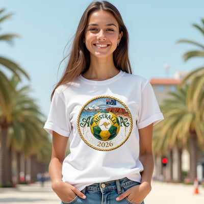 Woman wearing a white t-shirt with a 'Australia 2026' logo, palm trees in the background