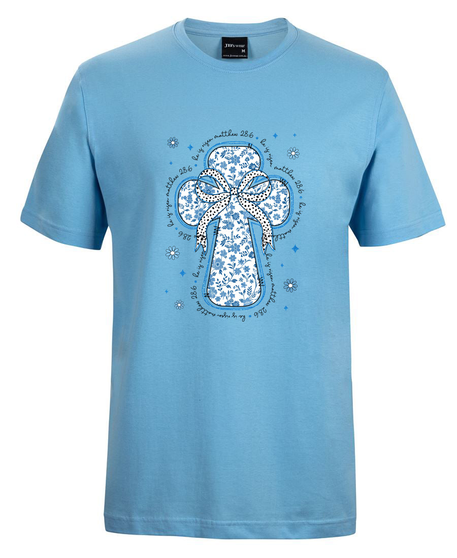 Light blue t-shirt with a decorative cross design on a white background