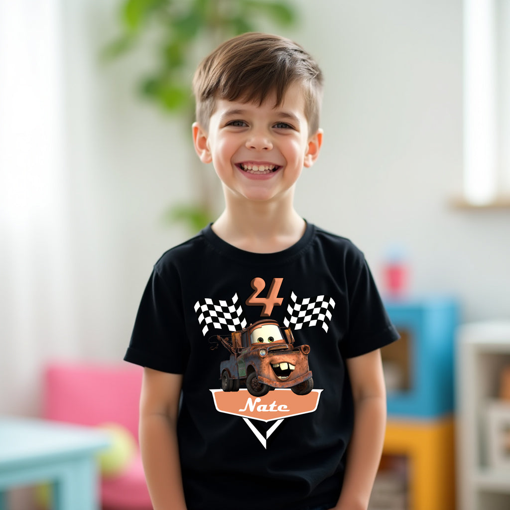 Child wearing a black t-shirt with a cartoon character and number 4 design.