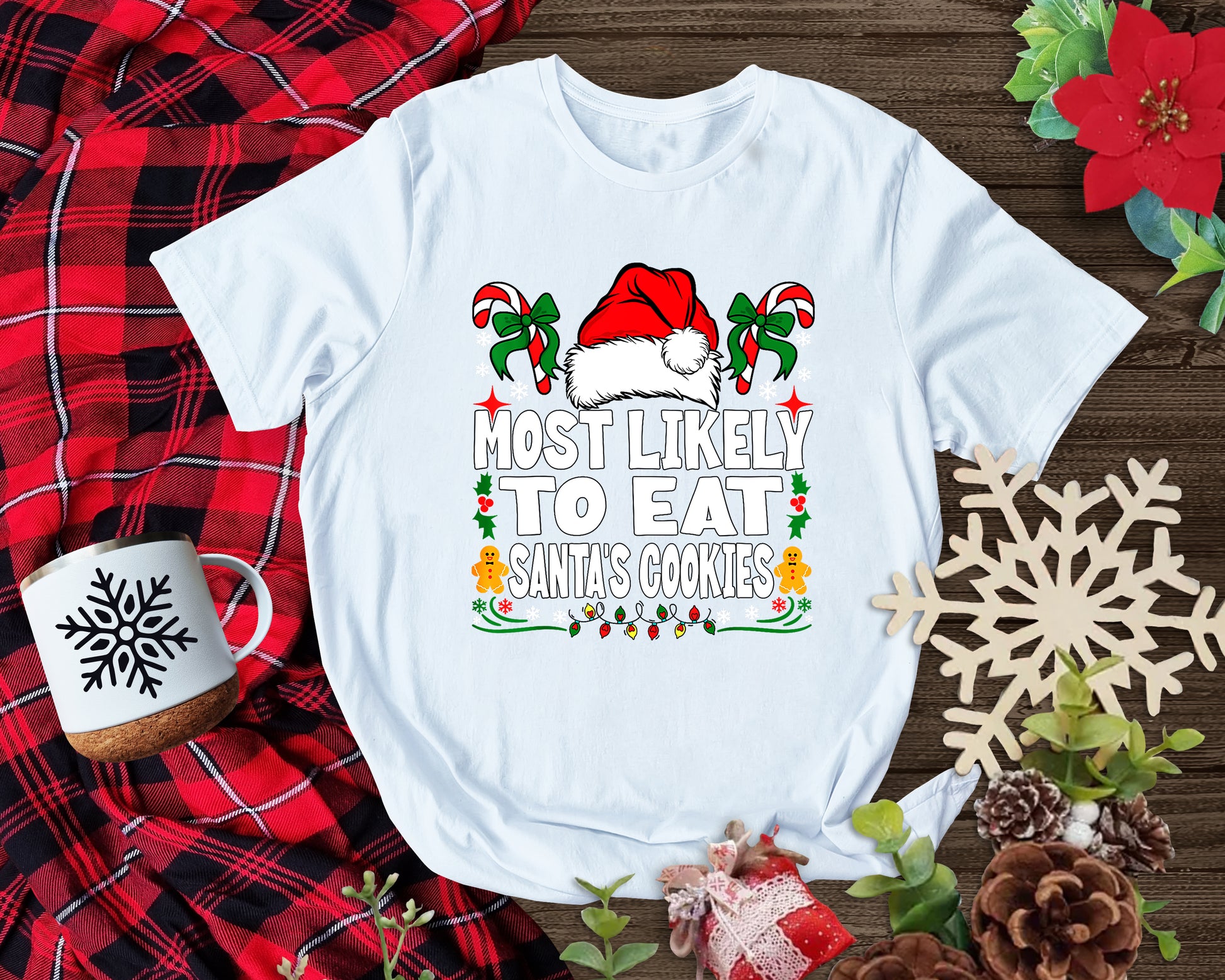 Holiday party tee featuring playful "Most Likely to Eat Santa’s Cookies" design