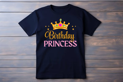 Black t-shirt with 'Birthday Princess' text and crown graphic on a wooden background