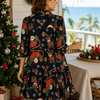 Woman in a festive dress standing next to a Christmas tree on a porch.