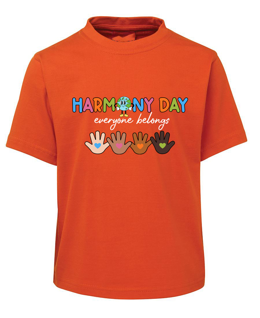 Orange t-shirt with 'Harmony Day everyone belongs' text and handprints on a white background