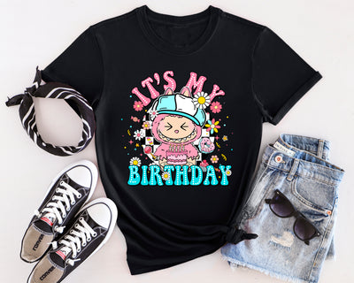 Cotton Candy Labubu birthday party t-shirt featuring monster character design with balloon and gift details.