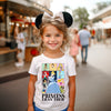 Child wearing the Fairytale Princess Eras tee at Disney theme park