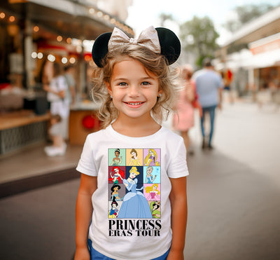 Child wearing the Fairytale Princess Eras tee at Disney theme park
