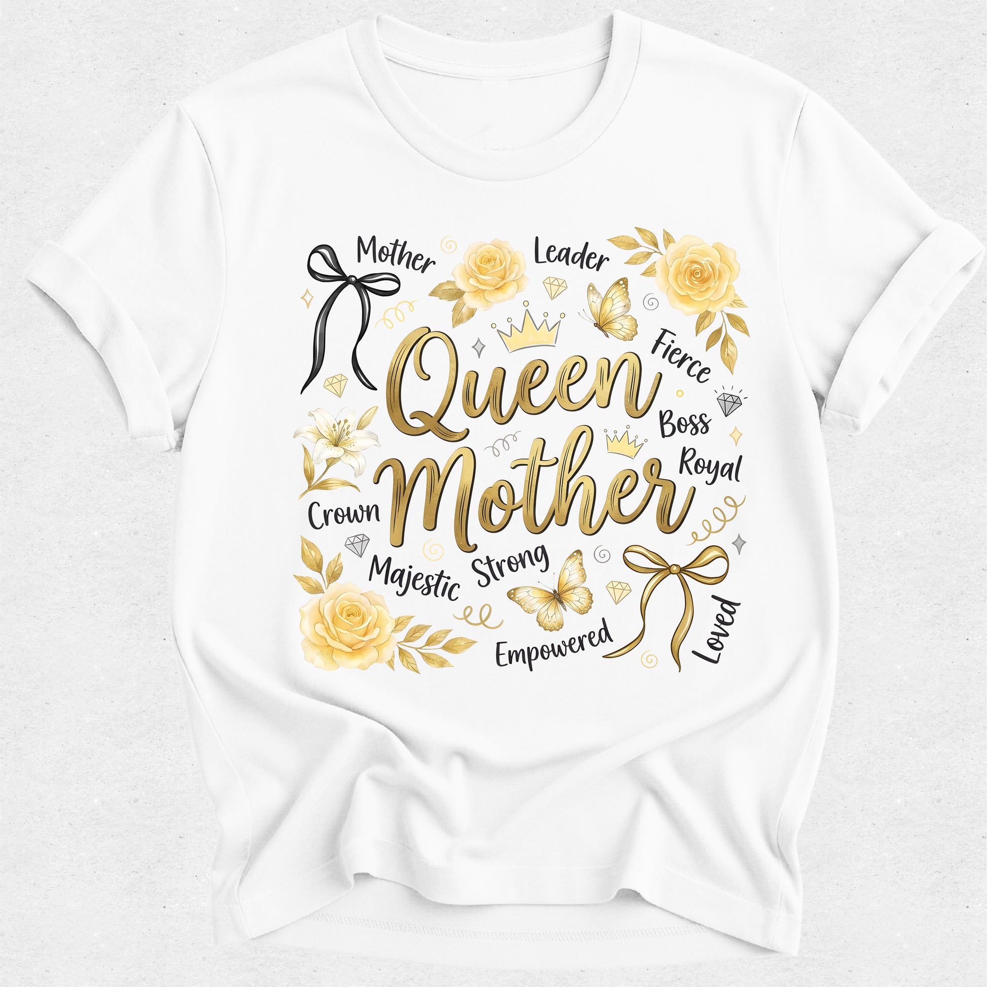 White t-shirt with gold text queen mother and floral designs on a white background