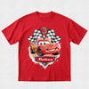 Red t-shirt with a cartoon car design and 'Nathan' text on a white background