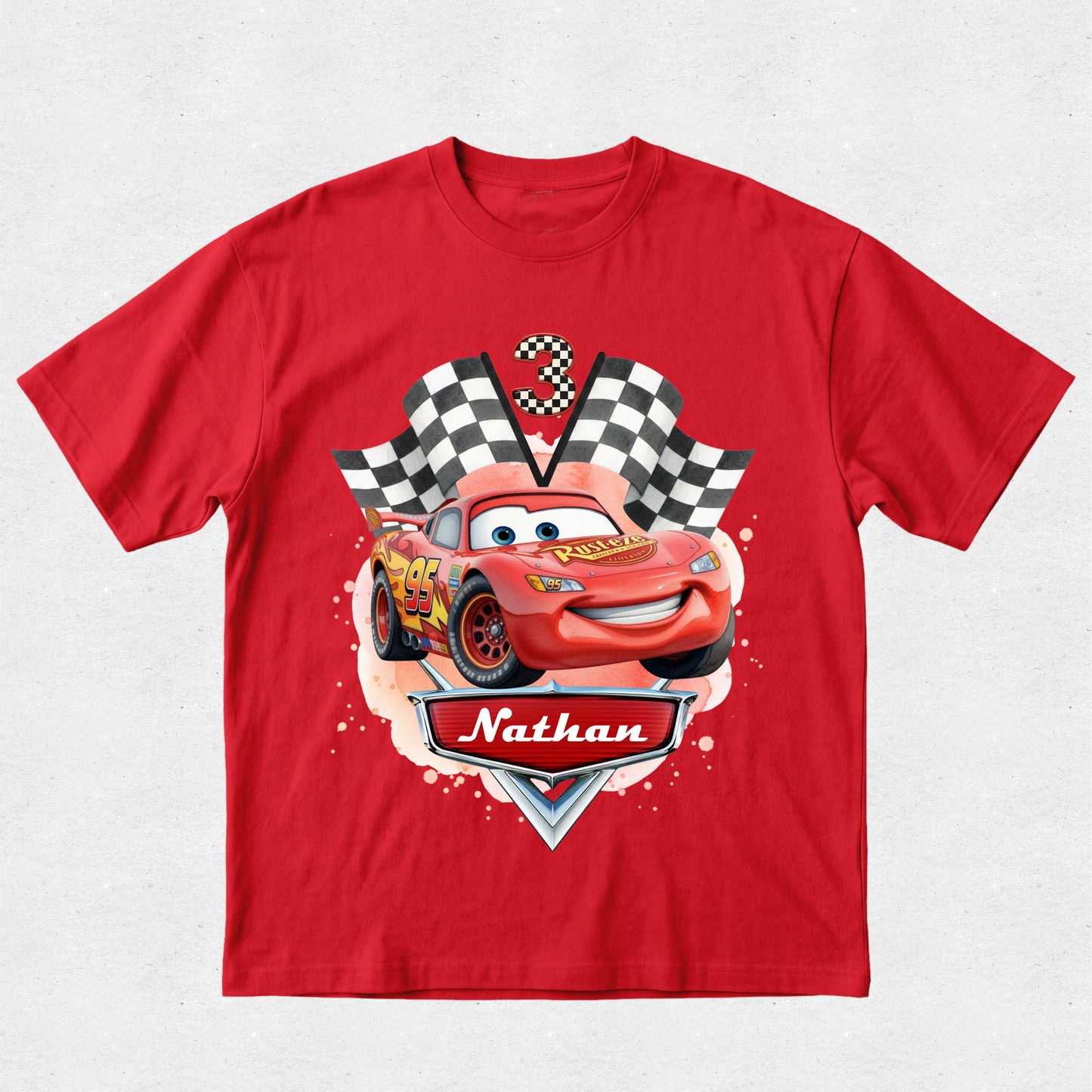 Red t-shirt with a cartoon car design and 'Nathan' text on a white background