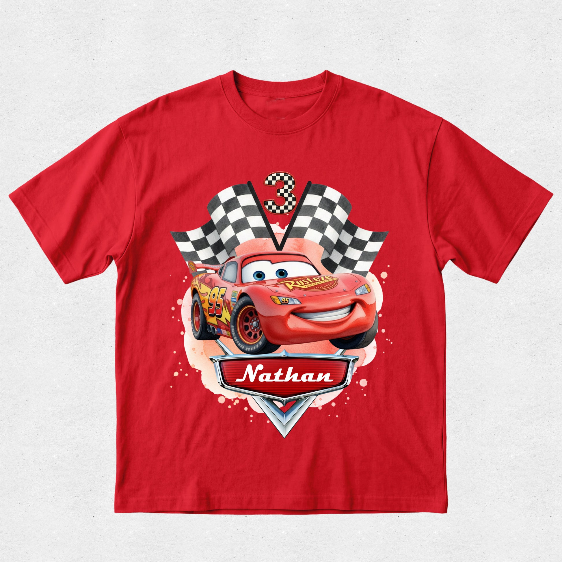 Red t-shirt with a cartoon car design and 'Nathan' text on a white background