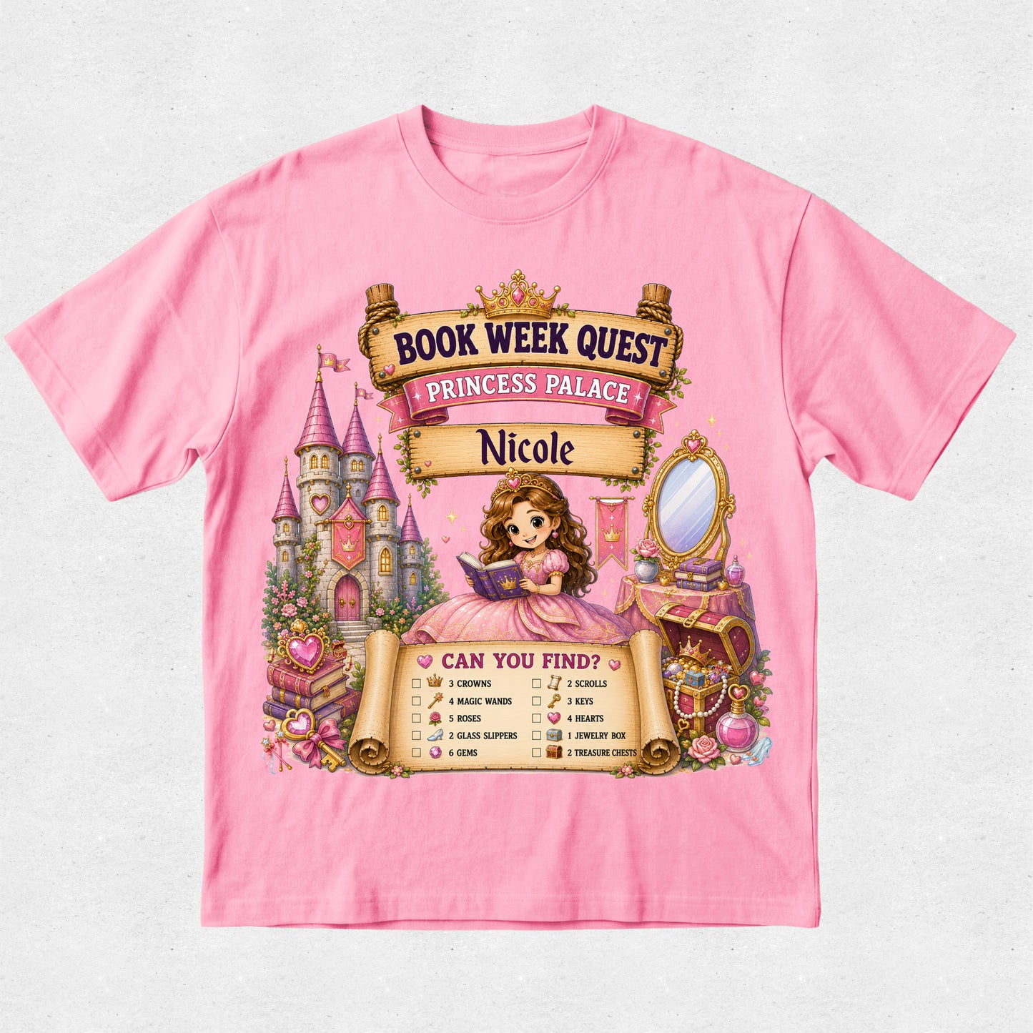A pink short-sleeve crewneck t-shirt featuring a detailed graphic print for a 'Book Week Quest Princess Palace' themed party. The graphic includes an illustration of a princess in a pink gown, a castle, a vanity mirror, and a checklist titled 'CAN YOU FIND?'.