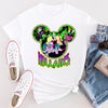 Flat lay of Villain Vibes shirt styled with jeans and accessories for Halloween or park day