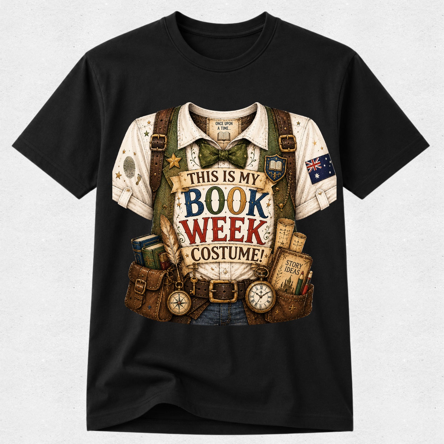 A black short-sleeve crewneck t-shirt featuring a large graphic print of a book-themed costume outfit. The graphic includes a white shirt, brown suspenders, a green bow tie, a blue-and-white Australian flag patch, and a brown utility belt with books, a compass, and a clock.