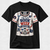 A black short-sleeve crewneck t-shirt featuring a detailed graphic of a white astronaut costume printed with the text 'THIS IS MY BOOK WEEK COSTUME!' in red, white, and blue.