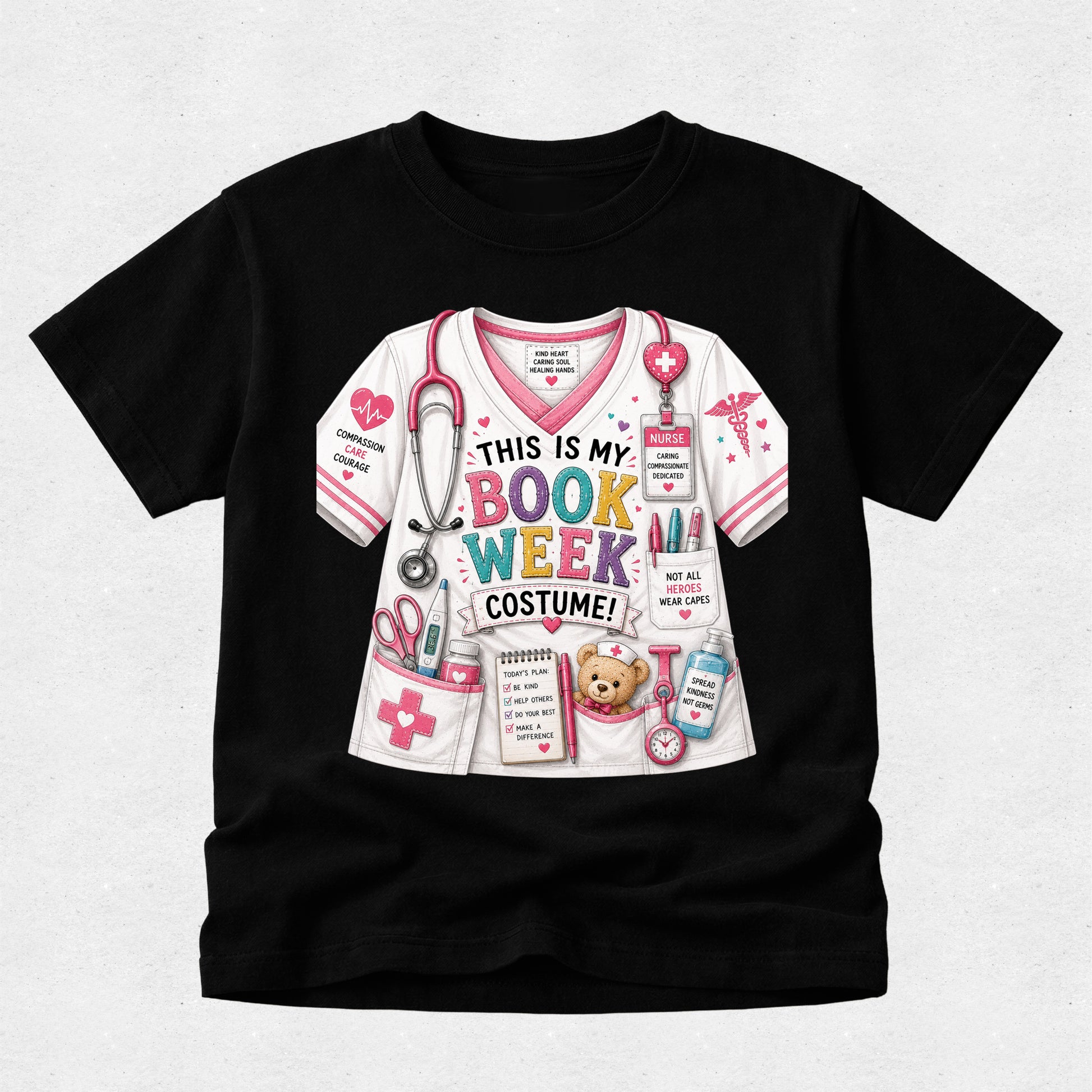 A black short-sleeve crewneck t-shirt featuring a colorful graphic print of a white medical costume shirt with the text 'THIS IS MY BOOK WEEK COSTUME!' and various book-themed illustrations.